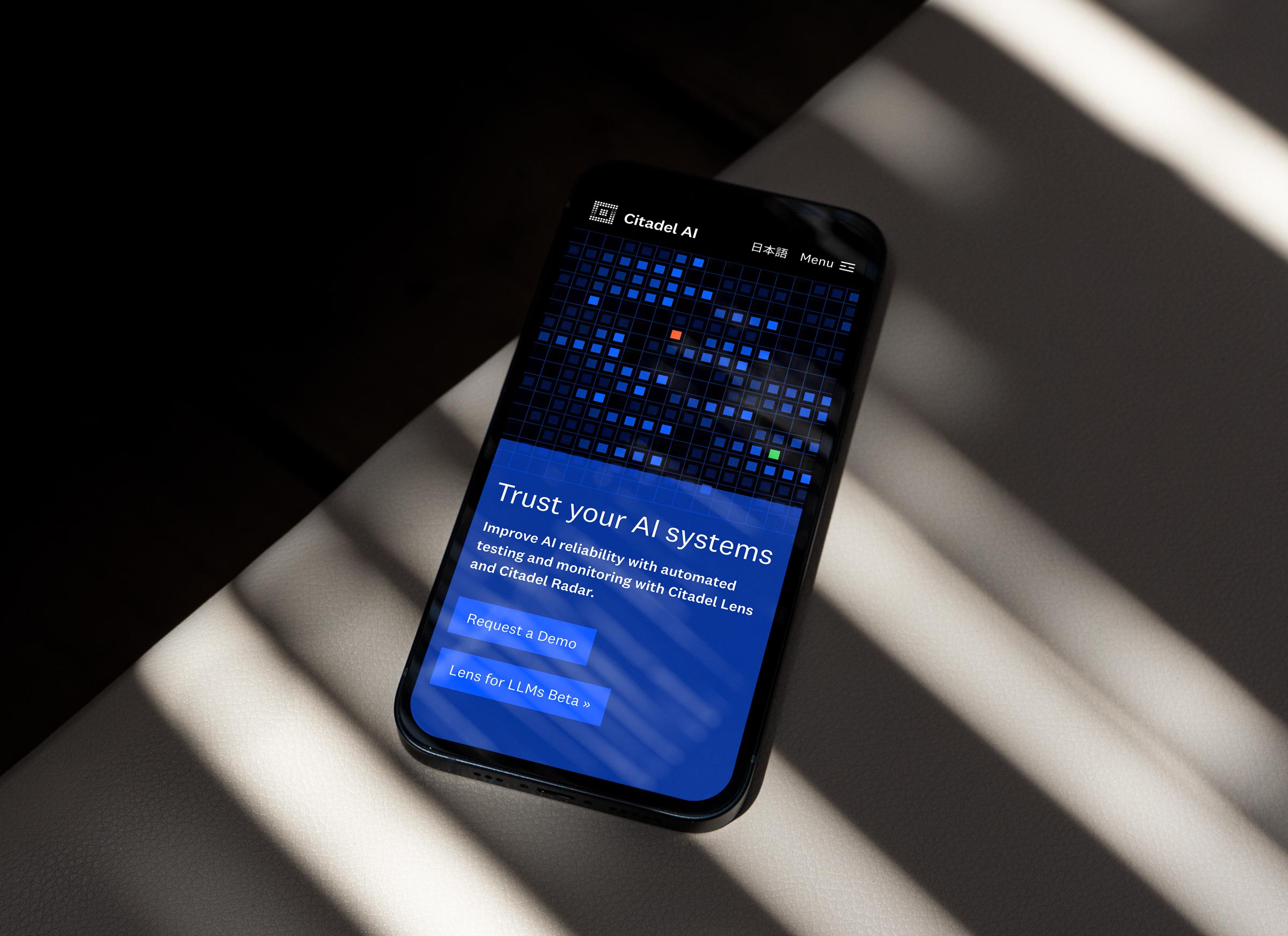 Citadel AI - Trustworthy AI. A mobile phone mockup with the UI/UX design of the homepage layout. Tokyo based design studio Bento Graphics provided research & strategy, wireframing, UI/UX design, web design and web development.